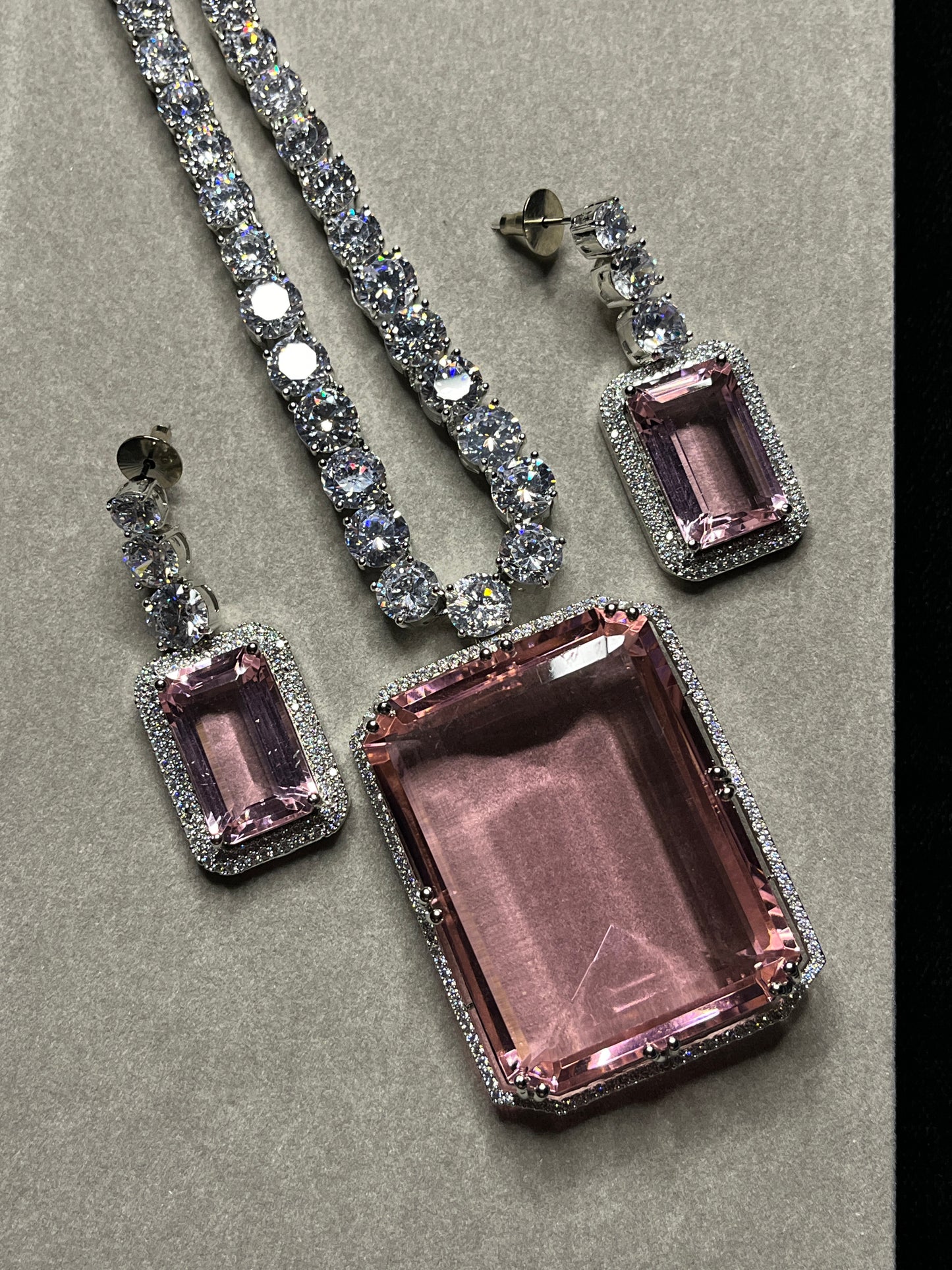 SS Classy Pink Radiance: Sophisticated Gem Pendant Necklace with Earrings.