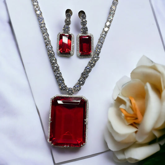 SS Classy Red Radiance: Sophisticated Gem Pendant Necklace with Earrings.